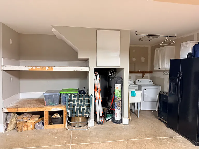 Top shelf in garage area can be used for additional storage space