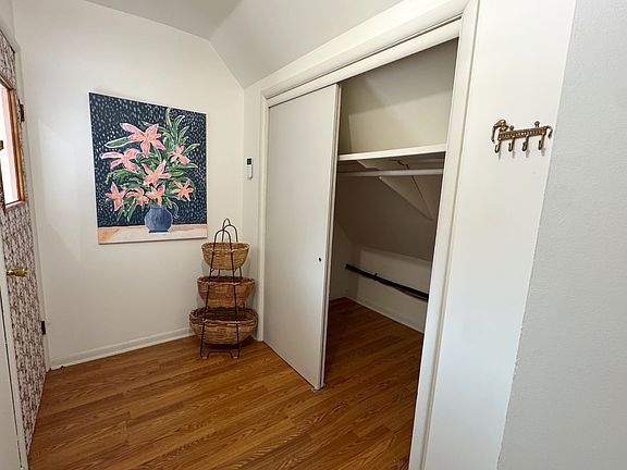 The closet in the entry hallway is nice and large for clothes, coats, and shoe storage.