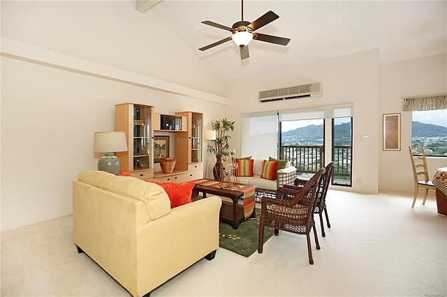A dreamy room with lofted ceilings all kept cool by Mitsubishi Split Air System.