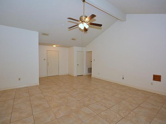 Front door opens to large den!