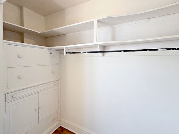 Walk-In Closet with Built-In Drawers