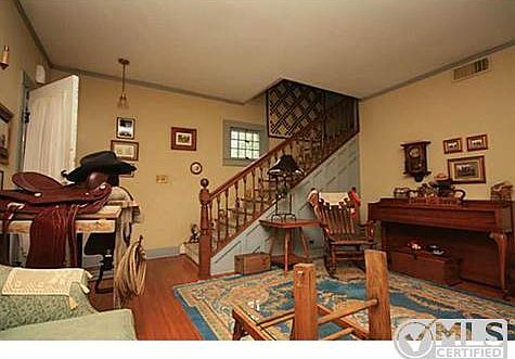 Entry to staircase and main living room