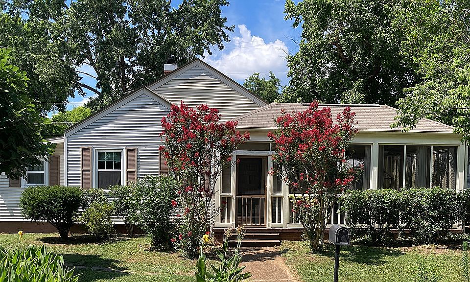 Lovely yard w/trees & shrubs