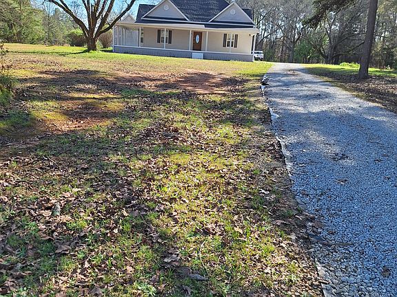 MAIN HOUSE AND DRIVE WAY