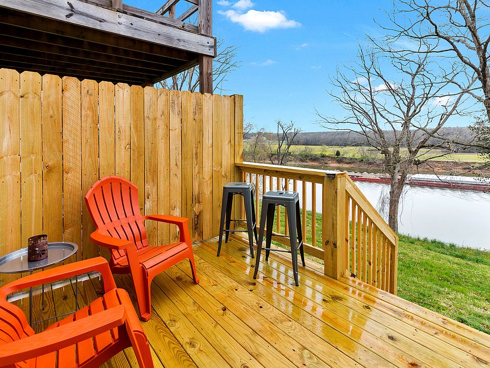 River Front View from your deck of Airbnb Additional furniture included in storage room off the deck of Airbnb