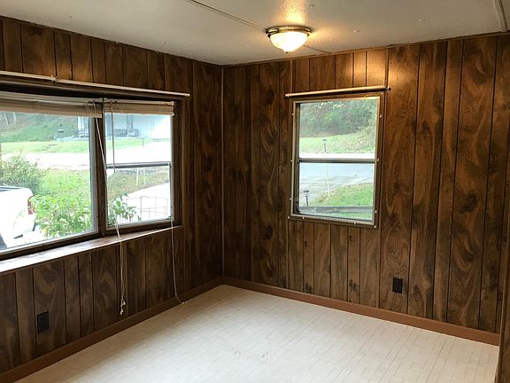 Kitchen dining area with view to driveway and main road