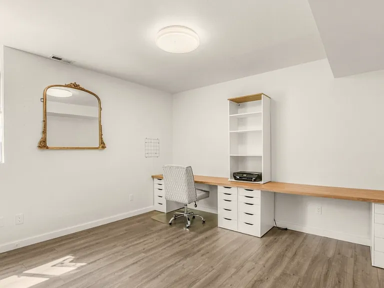 Located downstairs. Separate guest room or office.