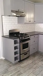 kitchen stove and wine rack