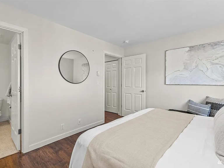 Primary bedroom with attached bathroom