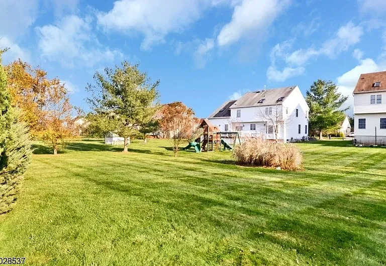 Beautiful large backyard including a deck