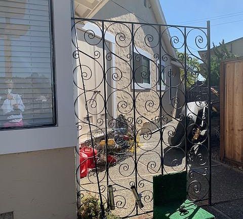 Side yard with SUP storage racks