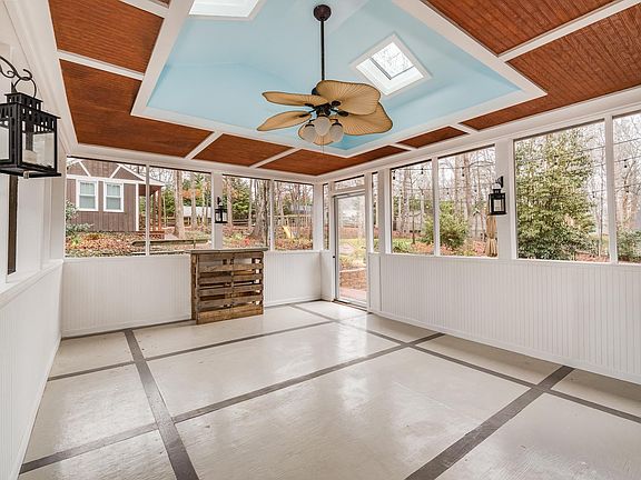 Screened back patio for entertaining or relaxing