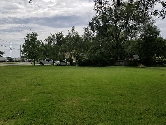 Property goes to wood fence.