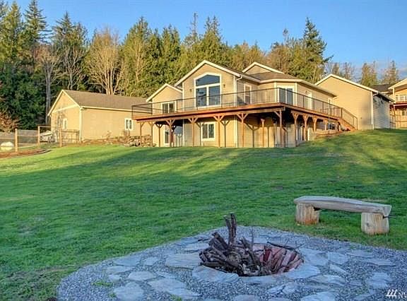 Looking from fire pit up to house