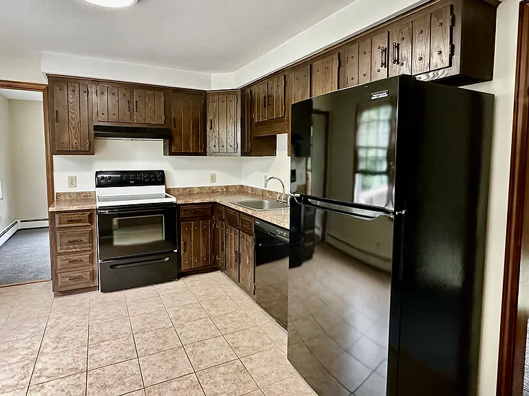 Eat in kitchen with new fridge