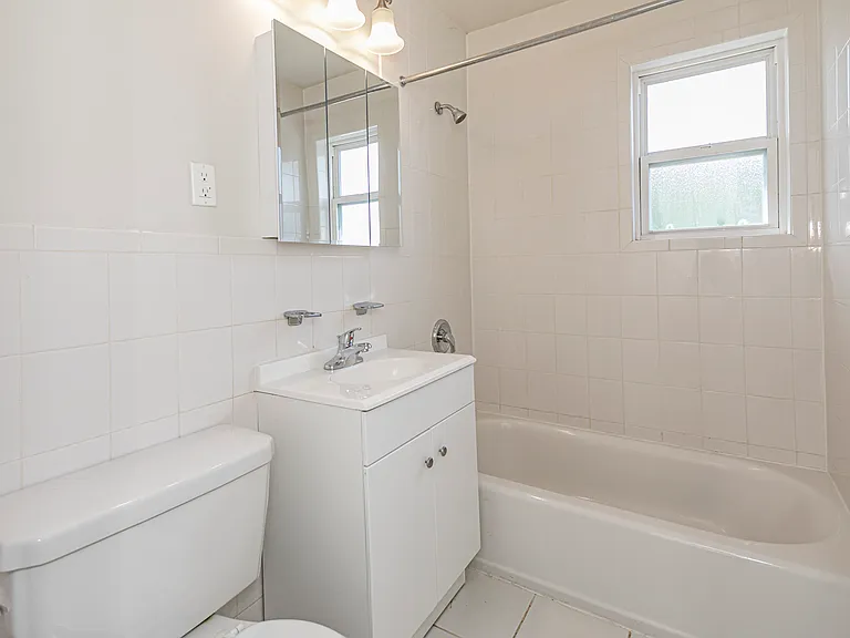 Neat and clean white bathrooms