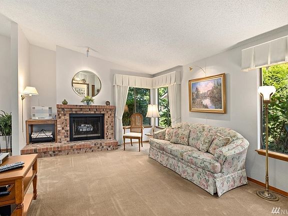 Cozy family room with wood burning fireplace