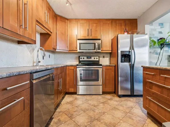 70 Midridge Gdns SE, Calgary, AB T2X 1C3