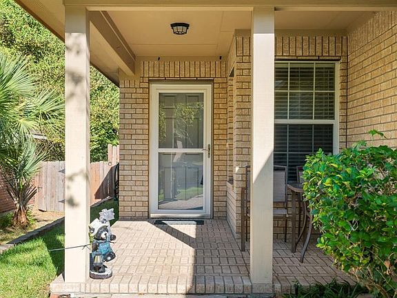 Nice, covered porch where you can sit and relax.