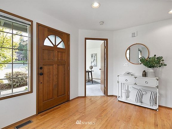 Welcome home! Warm hardwood floors greets you as you enter. Den to your left side and family room to your right side.