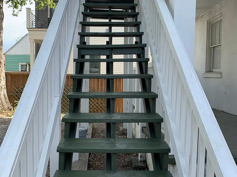 Back stairs leading to back porch