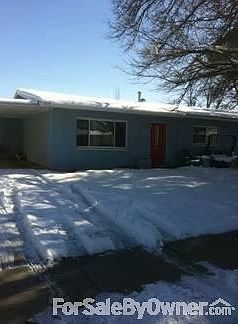Ranch style with covered carport
						:
						Double pane windows; all window treatment included, refrig air.