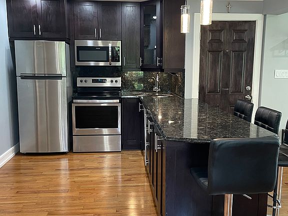 5th image of 8231 Archer Ave APT 9