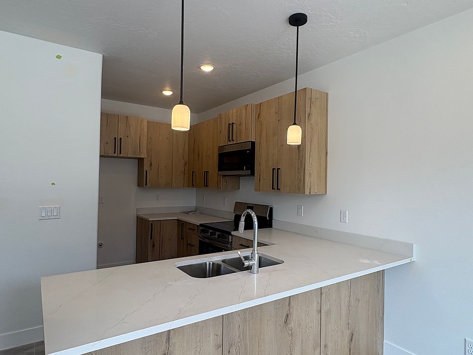 Kitchen comes with oven/stove, dishwasher, microwave, & refrigerator.