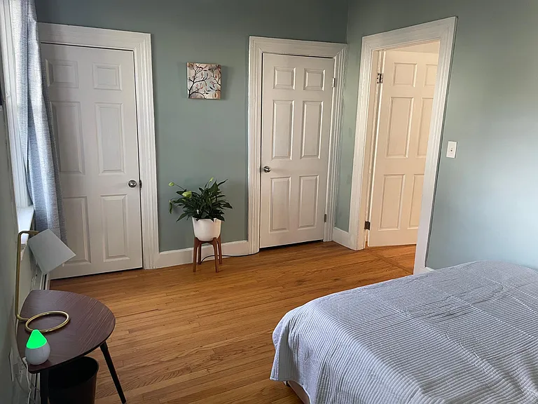 Primary bedroom with 2 walk-in closets