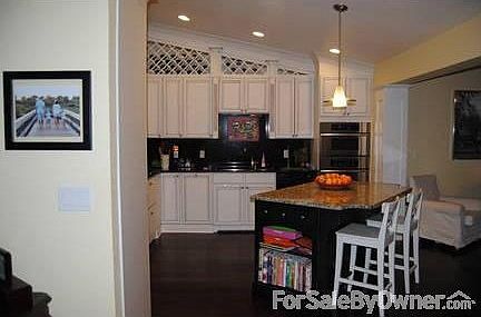 Kitchen : This home has a kitchen any chef would enjoy! Custom wooden cabinets & granite!