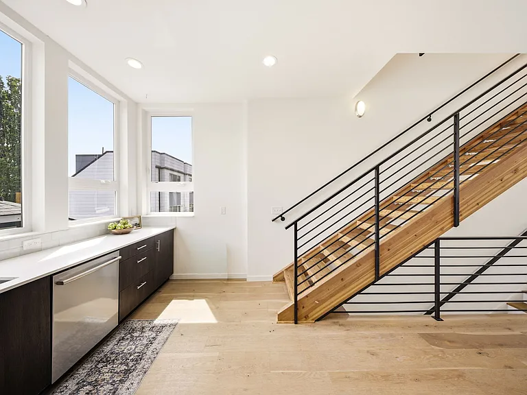 Kitchen + staircase to third floor
