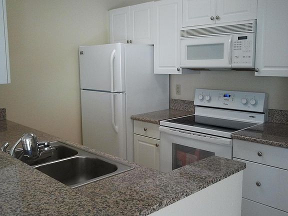 Nicely upgraded kitchen. Refrigerator and stove/oven new in