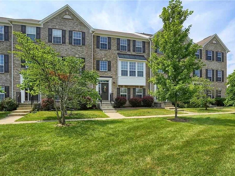 The only townhome with the large bay window in the building