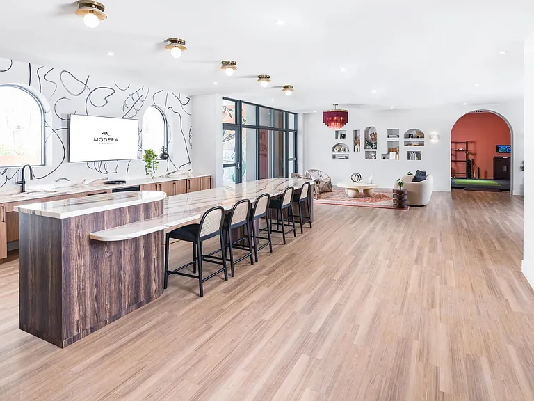 Relax in style at our 6th-floor resident lounge with a chic bar area.