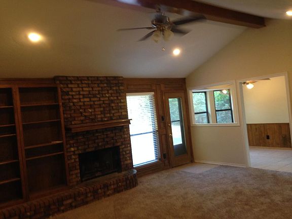 spacious den with fireplace