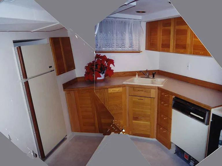Efficient kitchen with d/w; also under cabinet lighting