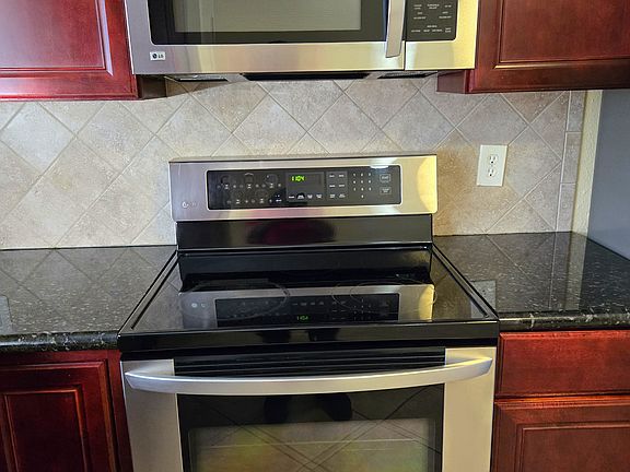 Electric stove and Over the range microwave.
