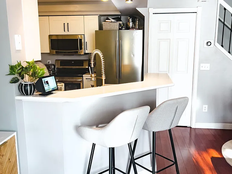 Open concept with hard flooring throughout the main level and modern, updated finishes