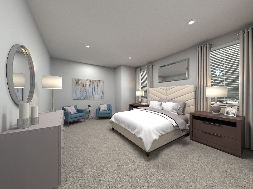 The luxurious primary suite offers a private retreat.