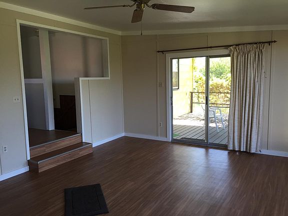 SUNROOM LOOKING OUT AT DECK
