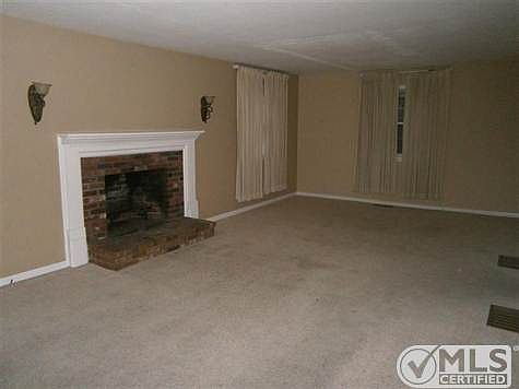 Front to back living room with fireplace