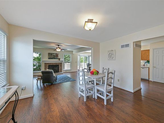 Charming open floor plan with engineered hardwood flooring