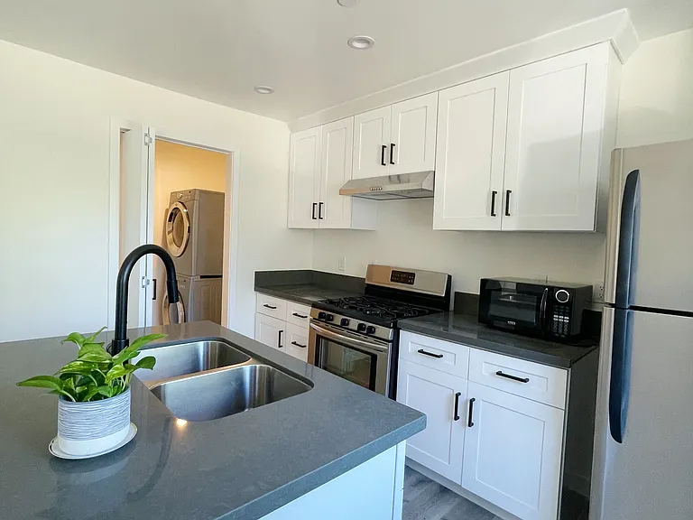 Private washer dryer room. Move in ready