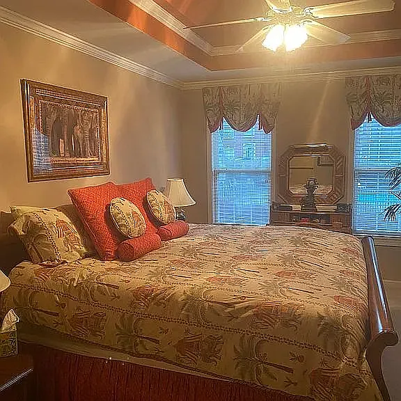 Upper sleeping level Master BR featuring ceiling Fan and Tray ceiling