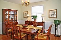 Elegant features full wood wainscoting throughout 