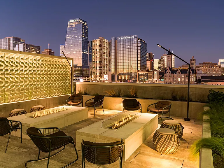 A rooftop retreat at Modera McGavock, where fire features and skyline views set the scene just minutes from downtown Nashville.