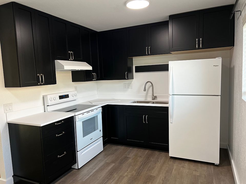 Kitchen has plenty of storage with tall upper cabinets