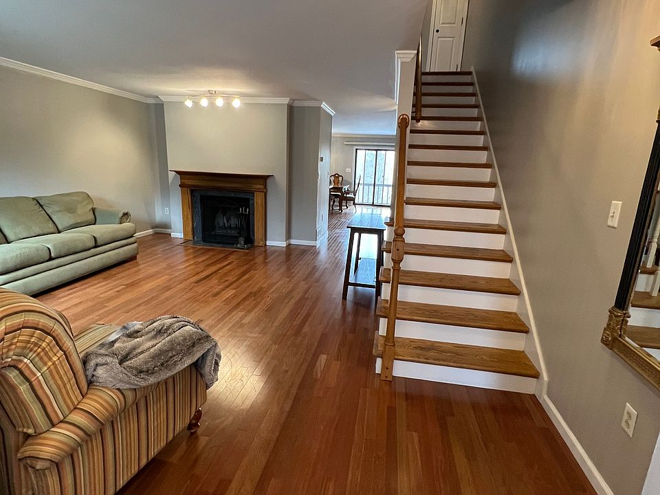 Living room New hardwood flooring on entire first floor. Wood burning fireplace