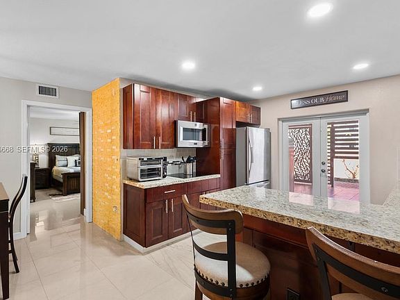 2nd image of 10951 W Okeechobee Rd Unit 101