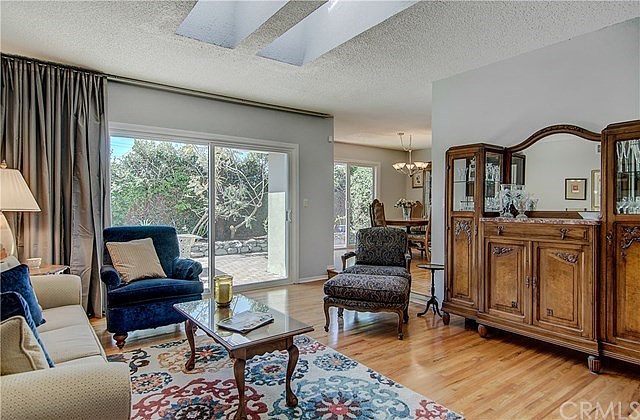 THE TOP FIVE REASONS WHY THIS IS AN AWESOME HOME!.....#1. Light Floods into the Formal Living Room. Gorgeous HARDWOOD FLOORS Abound.......